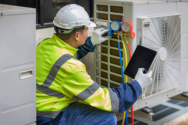 Professional Hvac Maintenance technician working in Creve Coeur, MO